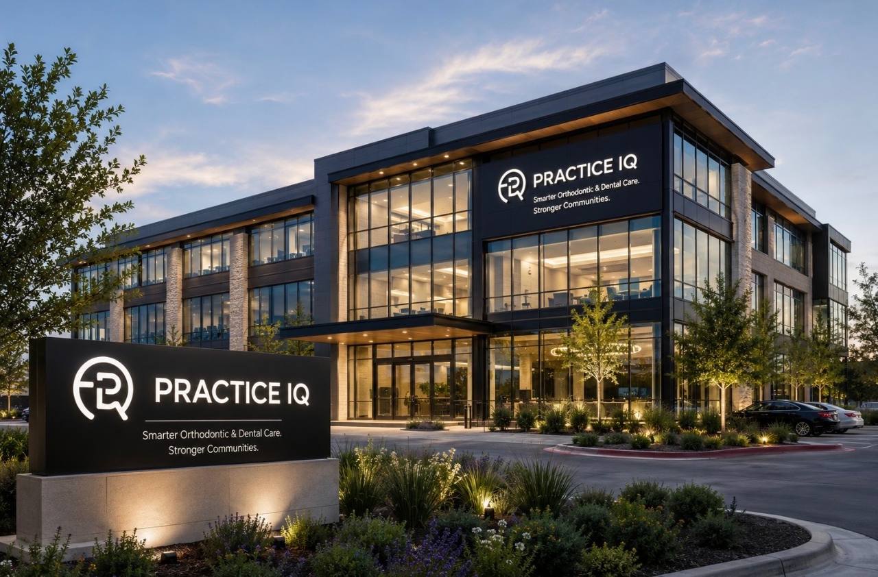 Brand concept rendering: a Practice IQ office building at dusk with exterior and monument signage.